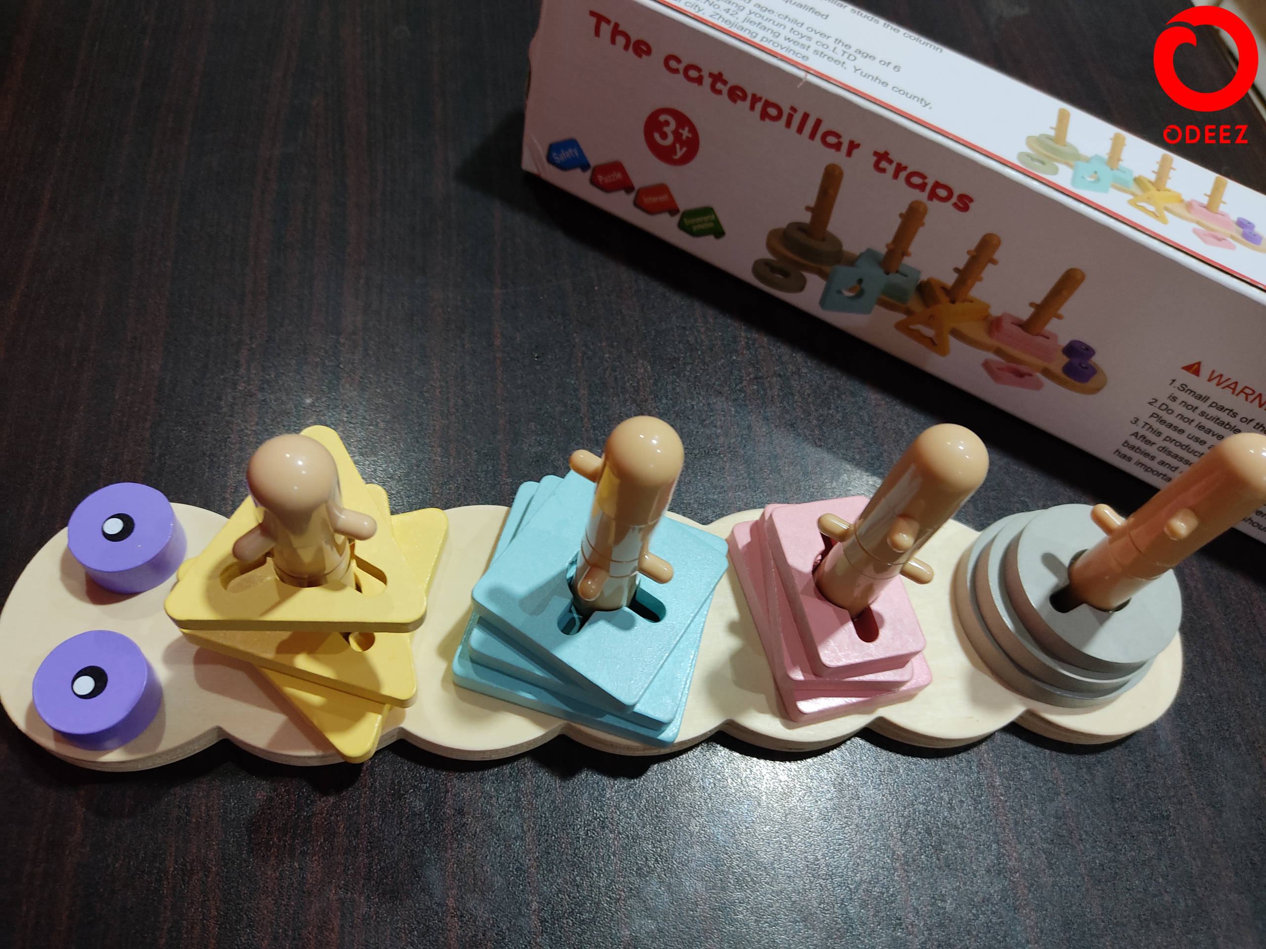 The Caterpillar Traps Wooden Toy